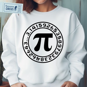 May include: White sweatshirt with a black circular design featuring the Pi symbol and digits of Pi. The sweatshirt has a crew neck and long sleeves. A small ticket with the text "Romanian CIRCUS" is visible.