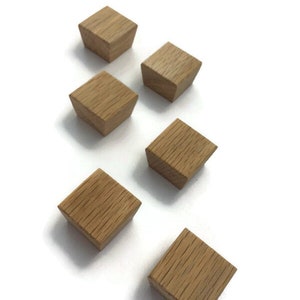 Cabinet knobs/ Oak  handle/ Square buttons.