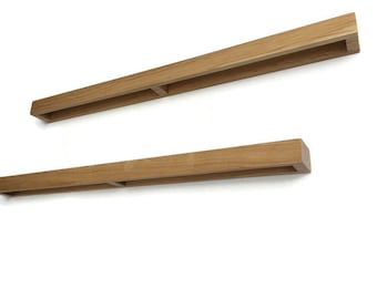 Handgemachte Griffe aus Naturholz.