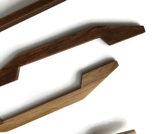 Wooden handles/natural oaq furniture pulls.