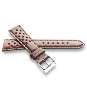 May include: Brown leather watch strap with a perforated design and contrasting stitching. The strap features a stainless steel buckle and is designed for a classic timepiece. The watch band is approximately 9 inches long.