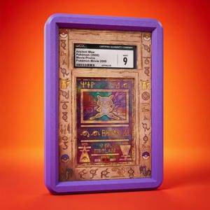 May include: A graded Ancient Mew Pokémon card from the year 2000, encased in a purple holder. The card features a Mew illustration and ancient-style text. The holder has the number 9 and the CGC logo.