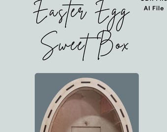 May include: A wooden Easter egg-shaped box with a cutout for a sweet treat. The box is brown and has a decorative border. The text "Easter Egg Sweet Box" is written above the box.