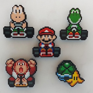Super Mario Kart SNES Gaming Magnete (Mario, Yoshie, Koopa Troopa, Donkey Kong Jr., Schildkrötenpanzer & Bananenschale)