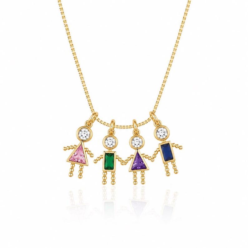 May include: A gold chain necklace featuring four charms shaped like figures holding hands. Each figure has a round clear stone head and a gemstone body: a pink triangular stone, a green rectangular stone, a purple triangular stone, and a blue rectangular stone.