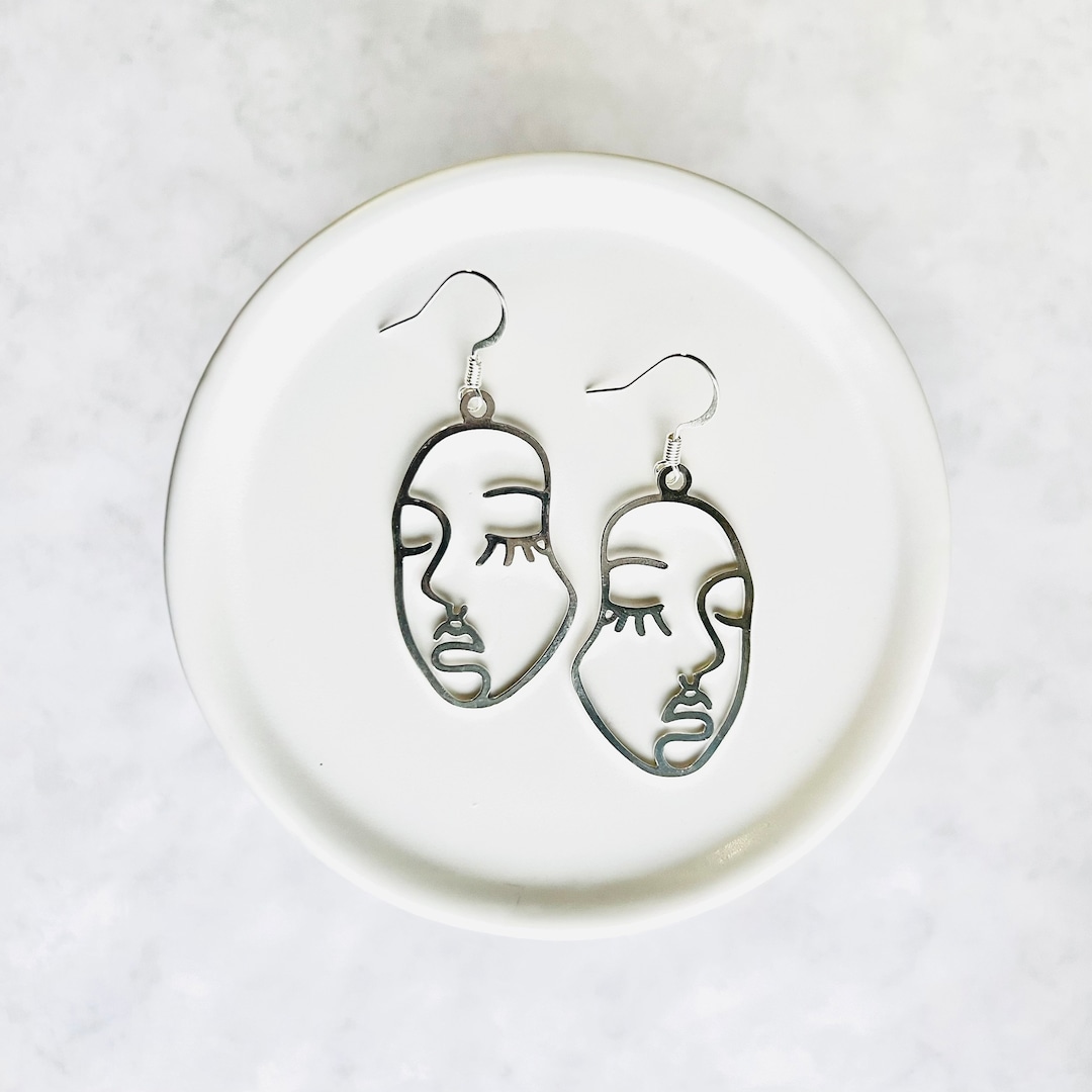 Face outline earrings Clearance