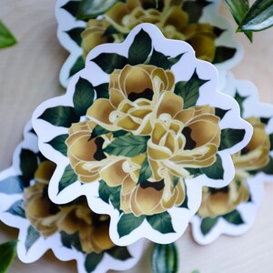 Adesivo de flores douradas
