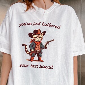 Comfort Colors Funny Cowboy Cat shirt, Cozy Cat Shirt, Meowdy Partner shirt,Gift Sarcastic tee,You&#39;ve Just Buttered Your Last Biscuit Shirt,