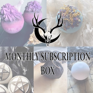 May include: A monthly subscription box with the text "MONTHLY SUBSCRIPTION BOX" in black letters on a white background. The box contains a variety of items, including bath bombs, candles, and other witchy items.