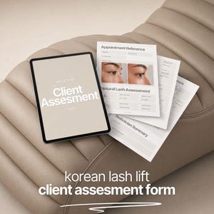 May include: A digital tablet displaying the text Lash Lift & Tint Client Assessment Form alongside printed paper forms featuring an Appointment Reference section, Natural Lash Assessment with eye imagery, and a Technician Summary section.