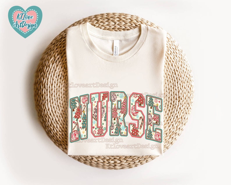 May include: A white t-shirt with the word "NURSE" printed in large, colourful letters. The letters are decorated with a floral pattern in shades of red, green, and blue.