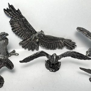PEWTER EAGLE FIGURINES set of 7