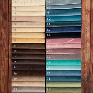 May include: A swatch card with 22 fabric samples in various colors and textures. The samples are numbered 1 through 22 on the left side and 59 through 80 on the right side.