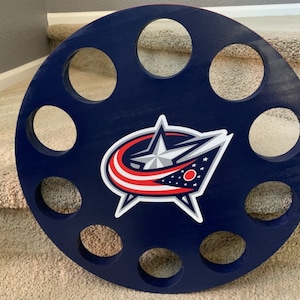 Columbus Blue Jackets 10 Hockey Puck Wall hanging Display