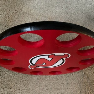 New Jersey Devils 10 Hockey Puck Wall hanging Display