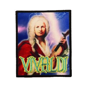May include: A rectangular embroidered patch featuring a portrait of Antonio Vivaldi with a white wig, wearing a red coat, and holding a violin. The background shows a blue sky with lightning bolts. The name VIVALDI is stitched in yellow letters.
