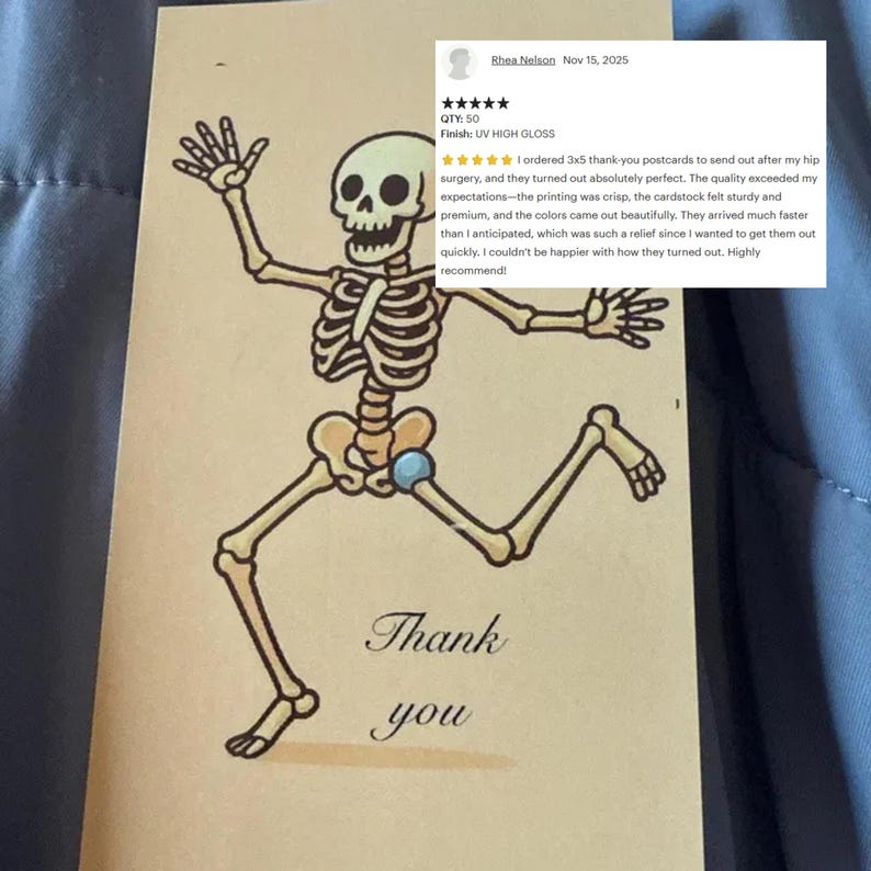 May include: A tan thank you postcard featuring a cartoon skeleton in a running pose. The skeleton is drawn in black and tan, with the words "Thank you" in elegant script below. The card has a UV high gloss finish.