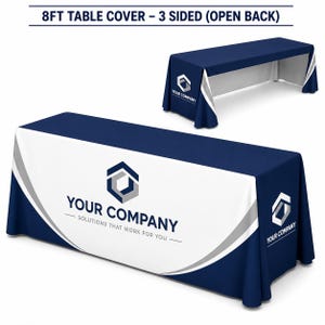 May include: An 8ft navy blue and white table cover with an open back design. The front and side panels feature a white curved graphic with the text YOUR COMPANY SOLUTIONS THAT WORK FOR YOU and a hexagonal logo printed in navy and grey.