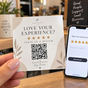 May include: A square white card featuring the text LOVE YOUR EXPERIENCE? LEAVE US A REVIEW, five gold stars, a black QR code, and the text Small Business Big Thanks. The card has beige abstract shapes and botanical illustrations on the corners.