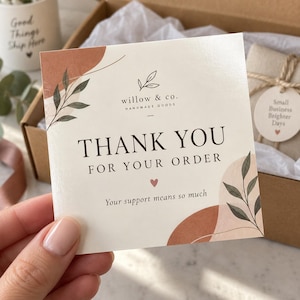 May include: A square thank you card with a cream background, featuring the text willow & co. HANDMADE GOODS, THANK YOU FOR YOUR ORDER, and Your support means so much. The design includes abstract terracotta shapes and green leaf illustrations.