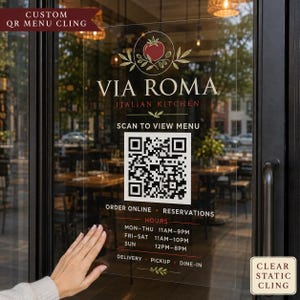 May include: A clear static cling window decal for Via Roma Italian Kitchen featuring a red tomato graphic, a large black and white QR code, and printed text including hours of operation, order online, reservations, delivery, pickup, and dine-in.