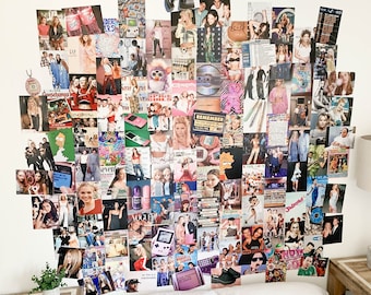 May include: A white wall covered in a collage of photos from the 1990s and early 2000s. The photos feature celebrities, fashion, and pop culture trends of the era. The collage is above a bed with white bedding and two gray patterned pillows.
