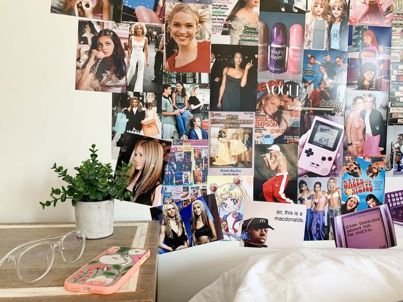 May include: A collage of images featuring celebrities and pop culture icons from the 90s and early 2000s. The collage includes images of Britney Spears, Christina Aguilera, and other popular figures. The collage is displayed on a wall with a small potted plant and a pair of glasses on a table in the foreground.