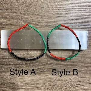 Pan-Afrikaanse enkelband, glaskralen, Black Pride-sieraden, rekbare band, duurzaam materiaal, afrocentrisch, vertegenwoordigen.