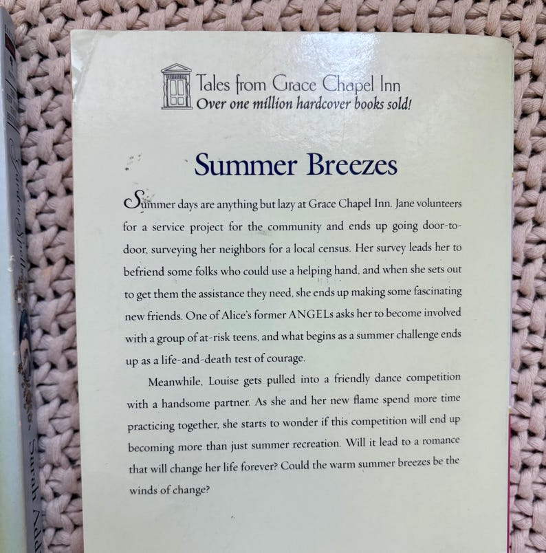 May include: A book cover with the title "Summer Breezes" from the "Tales from Grace Chapel Inn" series. The cover features text about the story's plot, including a summer challenge and romance.
