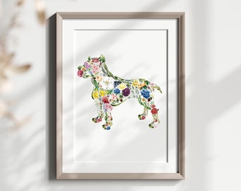 Puede incluir: Impresión enmarcada de una silueta de perro compuesta por flores coloridas. La obra de arte muestra una variedad de flores en tonos rojos, amarillos, azules y morados, creando una representación vibrante y artística de un canino.