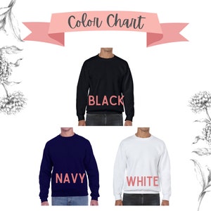 Peut inclure: Nuancier pr&eacute;sentant trois sweat-shirts &agrave; col rond noirs, marine et blancs. Chaque sweat-shirt porte le nom de sa couleur en rose. L'image est orn&eacute;e d'illustrations florales.