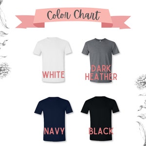 May include: A color chart displays four t-shirts in white, dark heather gray, navy, and black. The word "Color Chart" is in a pink banner above the shirts. Floral illustrations are in the background.