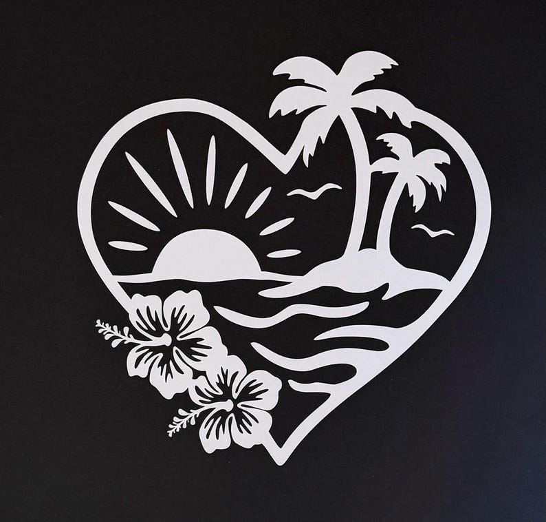 May include: White heart-shaped design on a black background. The design features a tropical scene with a sun setting over the ocean, palm trees on a small island, and hibiscus flowers. The overall theme is a tropical paradise.