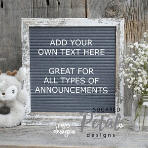 May include: A gray letter board with a white frame and white letters spelling "ADD YOUR OWN TEXT HERE GREAT FOR ALL TYPES OF ANNOUNCEMENTS". The letter board is sitting on a wooden surface with a small stuffed animal and a vase of white flowers.