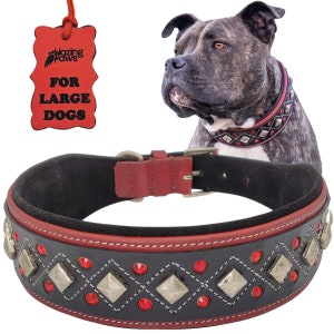 May include: Black leather dog collar with red stitching and silver studs. The collar is decorated with red rhinestones. The collar is labeled "For Large Dogs".