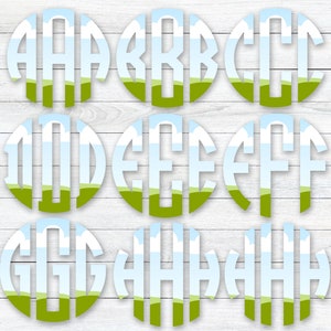 May include: Nine round, white, monogrammed letters with a blue sky and green grass background. The letters are A, B, C, D, E, F, G, H, and I.