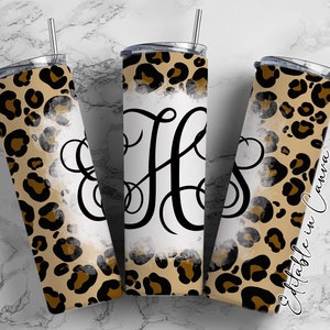 Puede incluir: Tres vasos de acero inoxidable con un dise&ntilde;o de estampado de leopardo y fondo blanco. Los vasos tienen un monograma de la letra "H" en una fuente cursiva. Los vasos son perfectos para agregar un toque de personalidad a tus bebidas cotidianas.