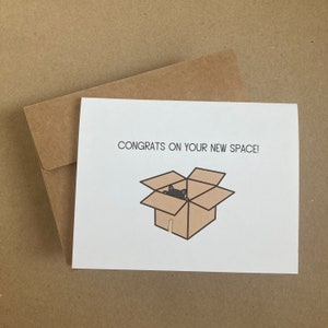 Félicitations pour votre nouvel espace ! - Carte de voeux - Chat dans un carton de déménagement