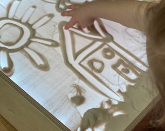 Light table with organic glass and white light. Montessori, Sensory table, wooden toy. LED box, Sand table.