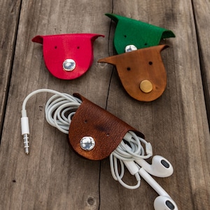 Leather cord organizer. Handmade earphone holder with dog design. USB sable organiser