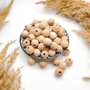 Holzperlen aus Buchenholz 12-30mm | naturbelassen & roh geschliffen | DIY Bastelperlen für Makramee, Schmuck und Babyzubehör