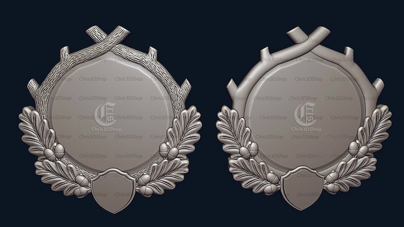 May include: Two silver-coloured, ornate, circular frames with a raised, textured design. Each frame features a central circle with a raised, textured border, surrounded by a wreath of oak leaves and acorns. The frames are decorated with a stylised letter "G" in the centre.