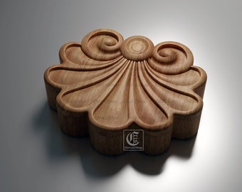May include: A wooden decorative element with a fan-shaped design and intricate carvings. The piece has a light brown color and a smooth finish.