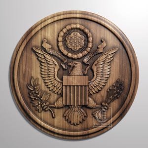 May include: A wooden plaque with a carved image of the Great Seal of the United States. The seal features an eagle with outstretched wings, a shield with thirteen stripes, and an olive branch and arrows.