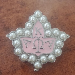 Broche de hoja de perla