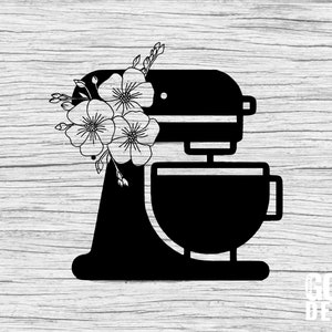 May include: Black and white silhouette of a stand mixer with floral accents. The mixer has a bowl and a stand with a lever. The flowers are stylized and have a simple design.