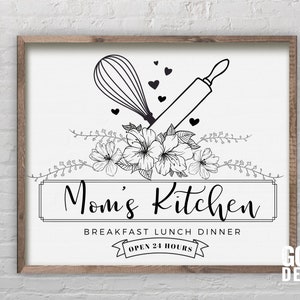 May include: Black and white illustration of a kitchen sign with a rolling pin and whisk crossed over each other. The sign reads "Mom's Kitchen" with the text "Breakfast Lunch Dinner" and "Open 24 Hours" below.