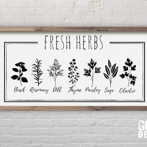 May include: Black and white silhouette print of various herbs, including basil, rosemary, dill, thyme, parsley, sage, and cilantro. The print is framed in a brown wood frame and has the text "FRESH HERBS" at the top.