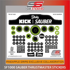 May include: A sheet of SF1000 Sauber Thrustmaster stickers. The design features black and green circular dials, buttons, and text labels. The stickers include the text "Stake Kick Sauber" and "Pineapple Grips".
