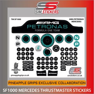 Könnte beinhalten: Ein Bogen mit SF1000 Mercedes Thrustmaster Aufklebern. Das Design zeigt das AMG Petronas Formula One Team Logo, sowie verschiedene Zifferblätter, Knöpfe und Beschriftungen in Schwarz, Türkis und Weiß. Eine Zusammenarbeit mit Pineapple Grips.
